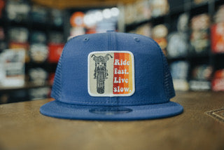 Ride fast. Live slow. Snapback Hat Royal Blue.